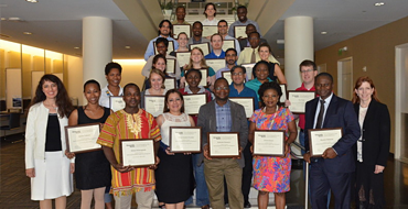 Photo of individuals who have earned SCL professional education certificates