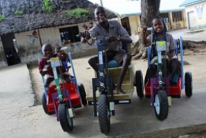 Patients in Kenya receive mobility carts donated by MedShare (Courtesy MedShare).